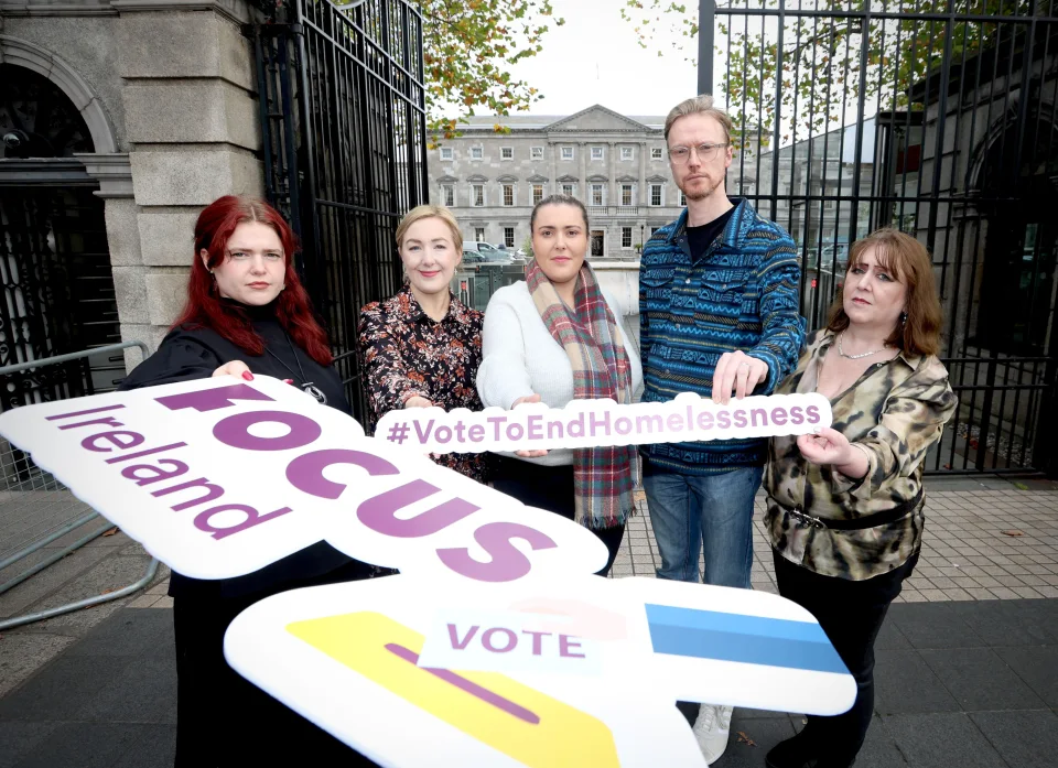 Members of Focus Ireland’s Advocacy Team outside Dail Eireann encouraging people to use their vote to end homelessness.